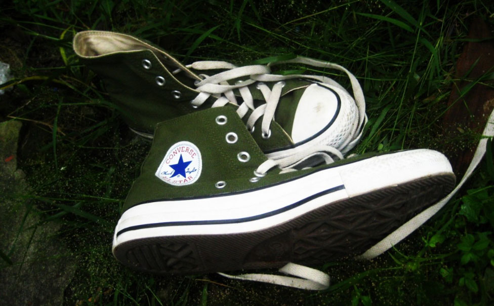 Army Green Converse in grass