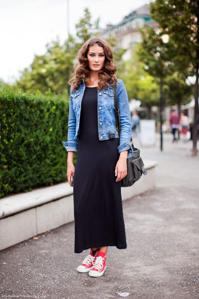Black Maxi Dress paired with denim jacket and Red high top Converse shoes